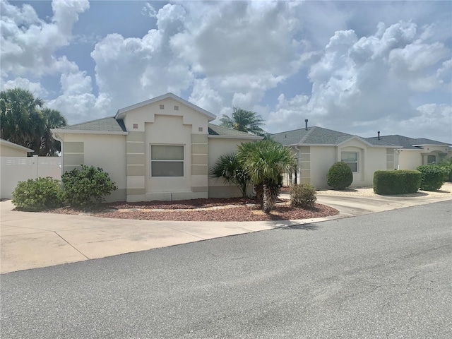 1524 Conway Ct, The Villages, FL 32162 - ranch-style home featuring stucco siding, concrete driveway, and roof with shingles