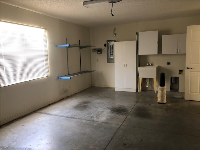 1524 Conway Ct, The Villages, FL 32162 - garage with baseboards and electric panel