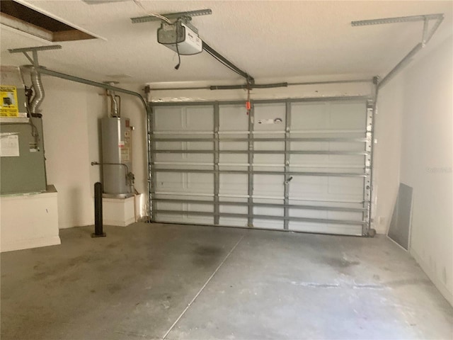 1524 Conway Ct, The Villages, FL 32162 - garage featuring water heater and a garage door opener