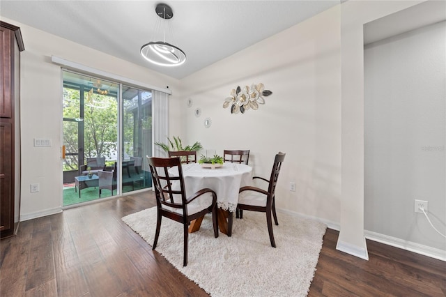 3508 Brighton Park Cir, Belle Isle, FL 32812 - dining space with dark wood finished floors and baseboards