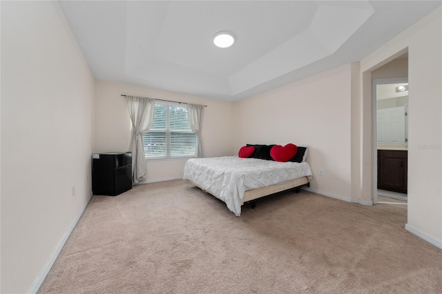 3508 Brighton Park Cir, Belle Isle, FL 32812 - carpeted bedroom with baseboards and a raised ceiling