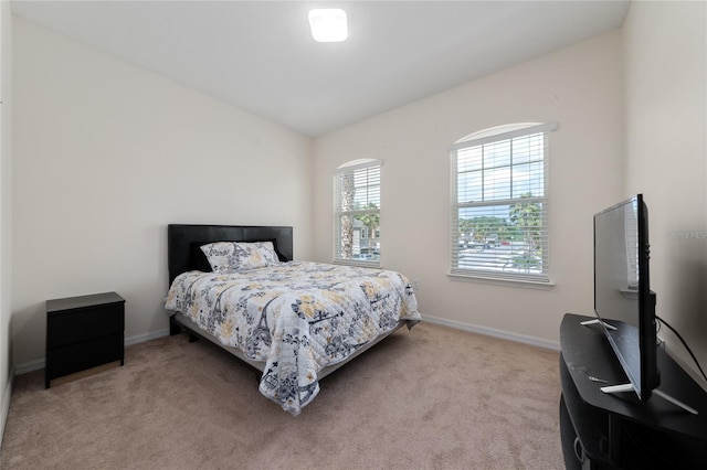 3508 Brighton Park Cir, Belle Isle, FL 32812 - bedroom featuring light carpet, baseboards, and an office area