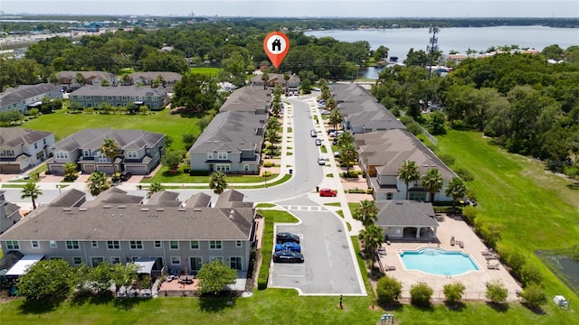 3508 Brighton Park Cir, Belle Isle, FL 32812 - aerial perspective of suburban area with a pool and a large body of water