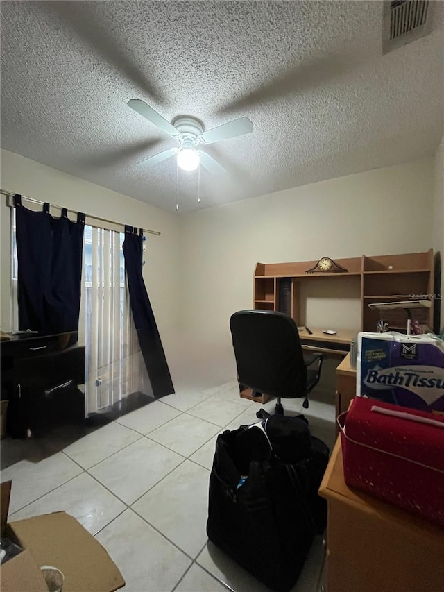 2765 Montego Bay Blvd, Kissimmee, FL 34746 - office featuring a ceiling fan, light tile patterned flooring, and a textured ceiling