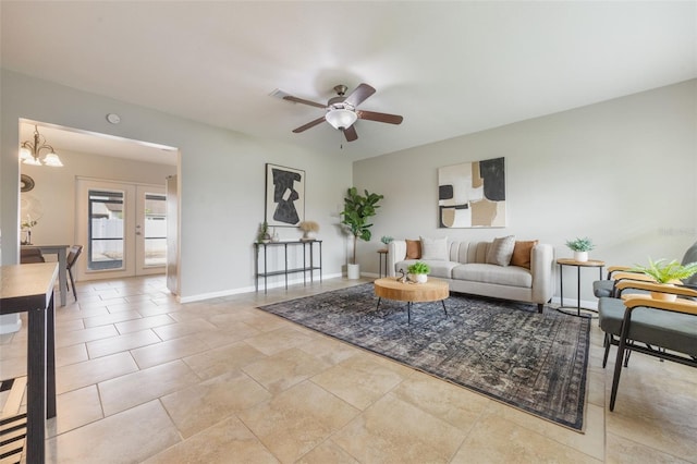 9494 Lake Lotta Cir, Gotha, FL 34734 - living area featuring a ceiling fan and a chandelier