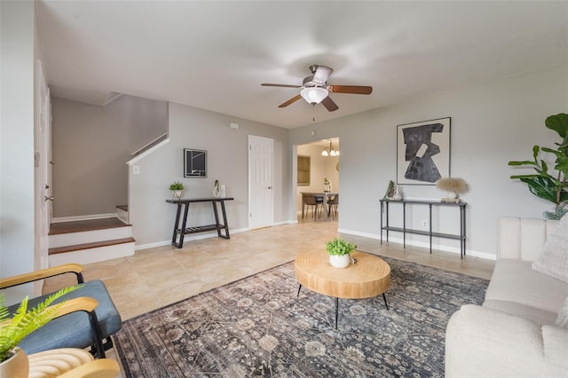 9494 Lake Lotta Cir, Gotha, FL 34734 - living area with stairs, a ceiling fan, and tile patterned flooring