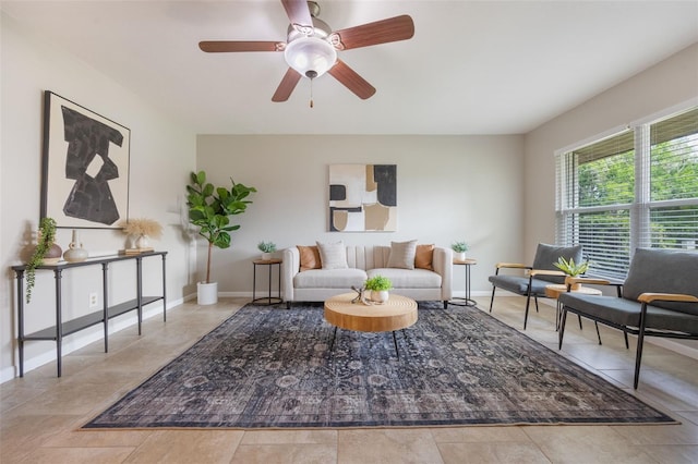9494 Lake Lotta Cir, Gotha, FL 34734 - living area with a ceiling fan and baseboards