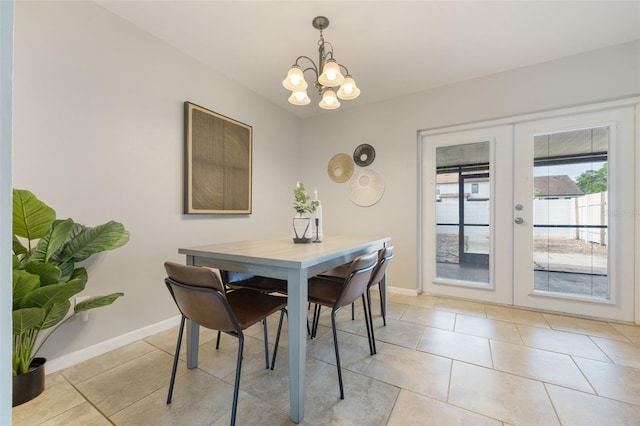 9494 Lake Lotta Cir, Gotha, FL 34734 - dining space with a chandelier, french doors, and light tile patterned flooring