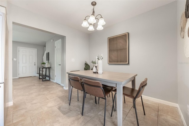 9494 Lake Lotta Cir, Gotha, FL 34734 - dining area with a chandelier and baseboards