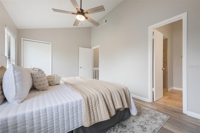 9494 Lake Lotta Cir, Gotha, FL 34734 - bedroom featuring lofted ceiling, light wood-style floors, and a ceiling fan