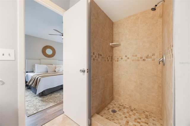 9494 Lake Lotta Cir, Gotha, FL 34734 - bathroom featuring ensuite bath, a stall shower, ceiling fan, and wood finished floors
