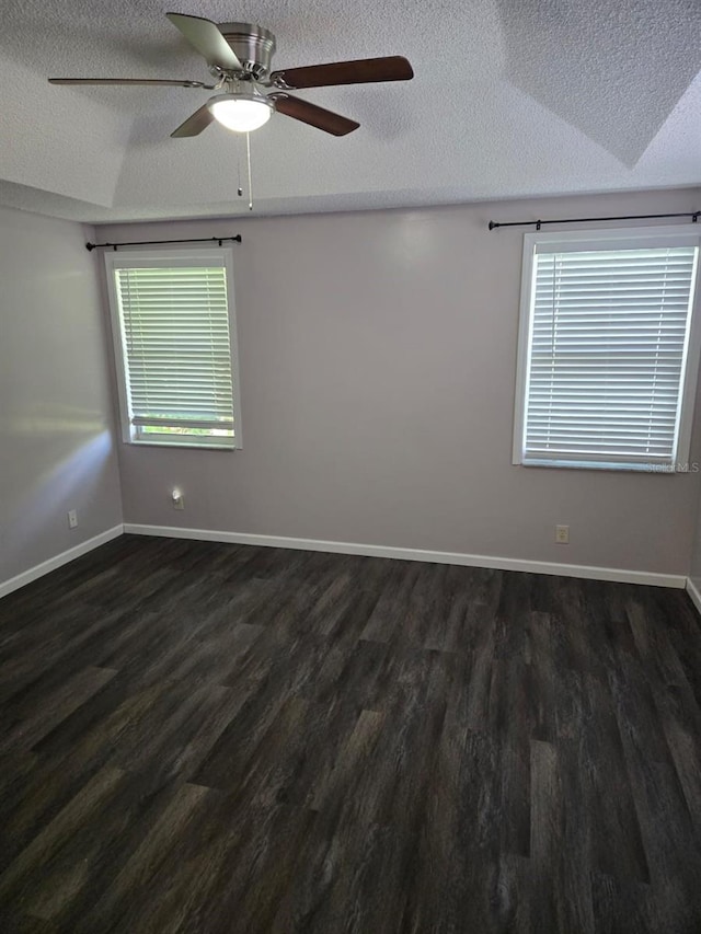 3869 Sienna Greens Ter, Lauderhill, FL 33319 - unfurnished room featuring a textured ceiling, dark wood finished floors, and a ceiling fan