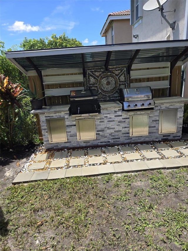 3869 Sienna Greens Ter, Lauderhill, FL 33319 - view of patio / terrace featuring an outdoor kitchen