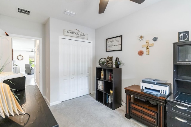 378 Cape Honeysuckle Pl, Sanford, FL 32771 - home office with a ceiling fan and light carpet