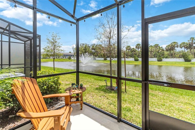 378 Cape Honeysuckle Pl, Sanford, FL 32771 - sunroom / solarium with a water view and plenty of natural light