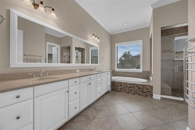 15344 Johns Lake Pointe Blvd, Winter Garden, FL 34787 - full bath with double vanity, a shower stall, a garden tub, crown molding, and tile patterned floors