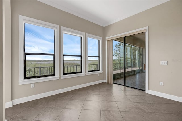 15344 Johns Lake Pointe Blvd, Winter Garden, FL 34787 - unfurnished room featuring crown molding and tile patterned flooring