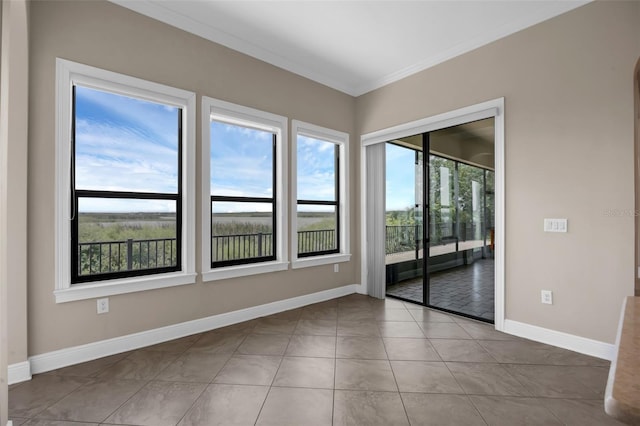 15344 Johns Lake Pointe Blvd, Winter Garden, FL 34787 - tiled empty room with baseboards and crown molding