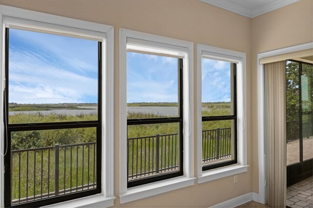 15344 Johns Lake Pointe Blvd, Winter Garden, FL 34787 - unfurnished sunroom featuring a water view and ornamental molding