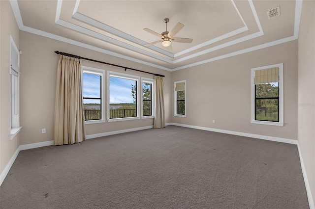15344 Johns Lake Pointe Blvd, Winter Garden, FL 34787 - unfurnished room featuring a raised ceiling, ornamental molding, a ceiling fan, and carpet flooring