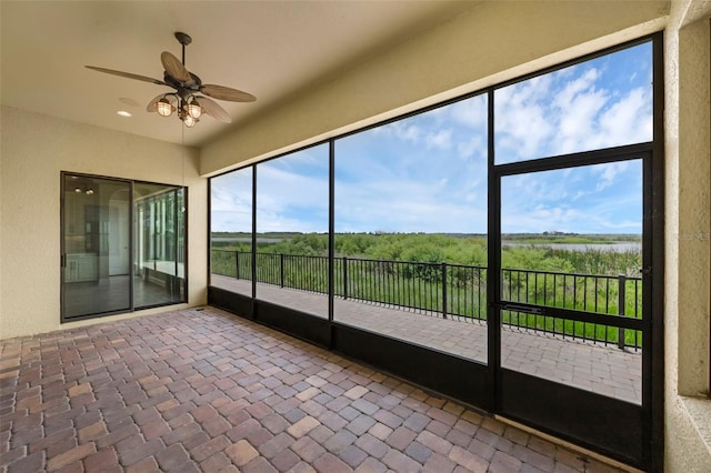 15344 Johns Lake Pointe Blvd, Winter Garden, FL 34787 - unfurnished sunroom featuring ceiling fan