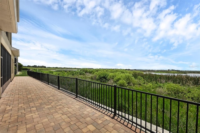 15344 Johns Lake Pointe Blvd, Winter Garden, FL 34787 - view of patio with a water view