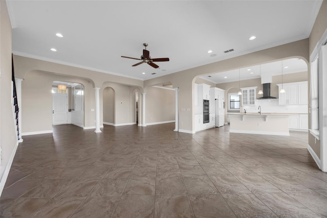 15344 Johns Lake Pointe Blvd, Winter Garden, FL 34787 - unfurnished living room featuring ceiling fan, arched walkways, ornamental molding, and recessed lighting