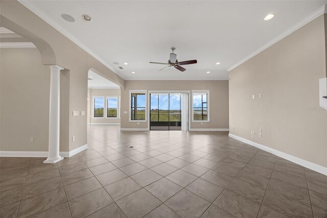 15344 Johns Lake Pointe Blvd, Winter Garden, FL 34787 - tiled spare room featuring ceiling fan, recessed lighting, arched walkways, ornamental molding, and decorative columns