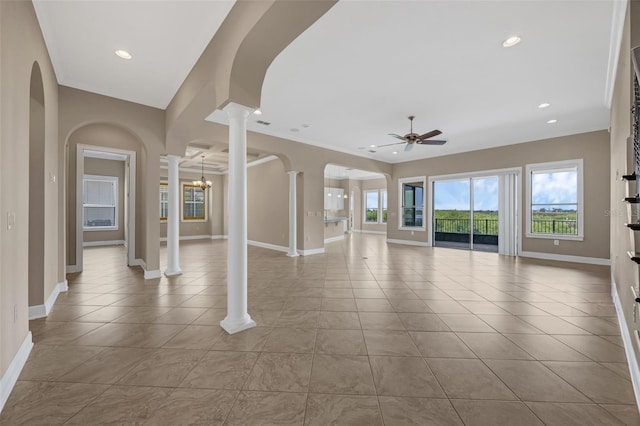 15344 Johns Lake Pointe Blvd, Winter Garden, FL 34787 - unfurnished living room featuring ceiling fan, ornate columns, recessed lighting, arched walkways, and tile patterned floors