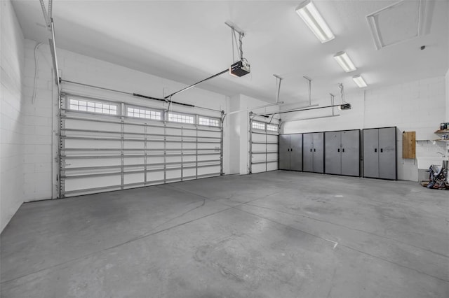 15344 Johns Lake Pointe Blvd, Winter Garden, FL 34787 - garage featuring a garage door opener