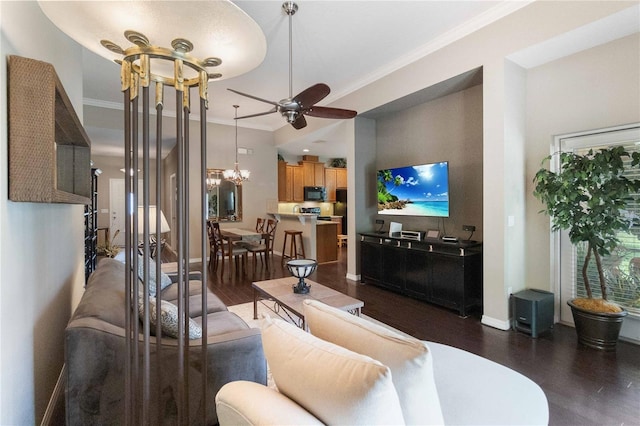 3637 Foxchase Dr, Clermont, FL 34711 - living room featuring dark wood-style floors, ceiling fan, ornamental molding, and a chandelier