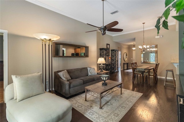 3637 Foxchase Dr, Clermont, FL 34711 - living room with wood finished floors, ornamental molding, ceiling fan, and a chandelier