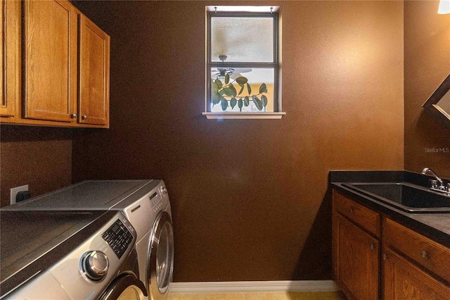 3637 Foxchase Dr, Clermont, FL 34711 - laundry area with washer and clothes dryer and cabinet space