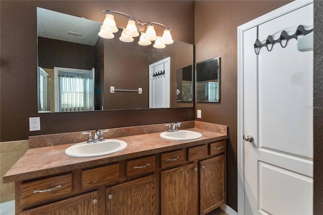 3637 Foxchase Dr, Clermont, FL 34711 - bathroom with double vanity and an enclosed shower