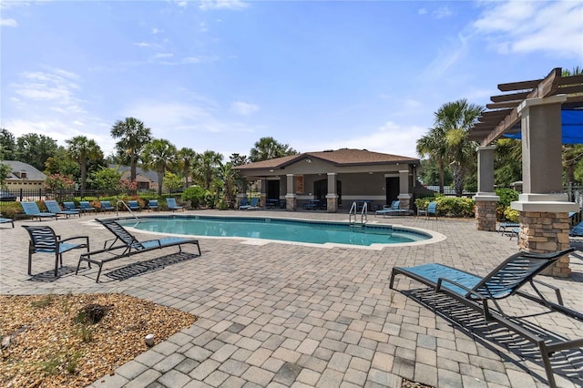 3637 Foxchase Dr, Clermont, FL 34711 - community pool featuring a patio and a pergola