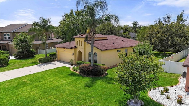 3637 Foxchase Dr, Clermont, FL 34711 - view of front of home with concrete driveway, stucco siding, and a garage