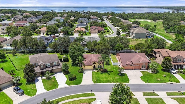 3637 Foxchase Dr, Clermont, FL 34711 - aerial perspective of suburban area featuring a nearby body of water