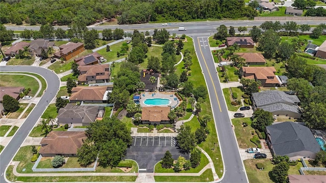 3637 Foxchase Dr, Clermont, FL 34711 - aerial view of property's location with a pool and nearby suburban area