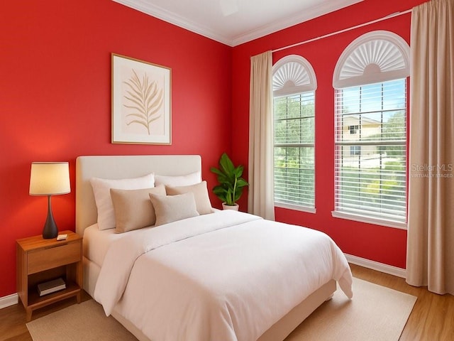 3637 Foxchase Dr, Clermont, FL 34711 - bedroom with wood finished floors and ornamental molding