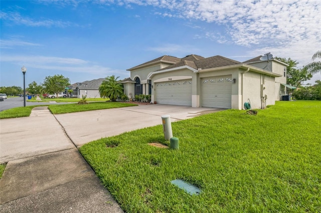 742 Seneca Trl, Saint Cloud, FL 34772 - view of front of home with stucco siding, an attached garage, a front lawn, driveway, and central AC unit