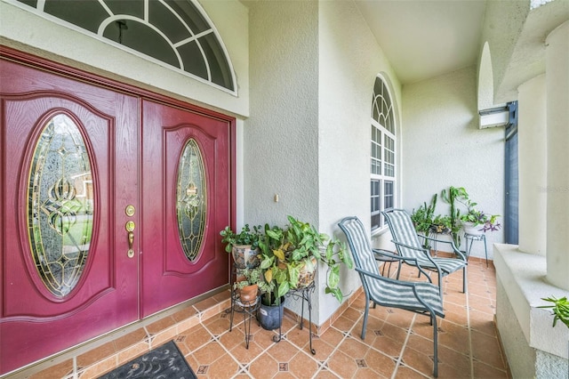 742 Seneca Trl, Saint Cloud, FL 34772 - property entrance with covered porch and stucco siding
