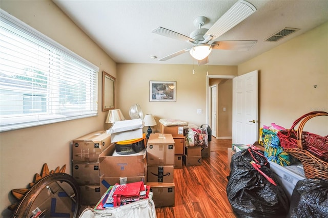 742 Seneca Trl, Saint Cloud, FL 34772 - bedroom with wood finished floors and a ceiling fan