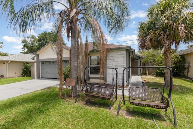 3280 Pinto Dr, Kissimmee, FL 34746 - ranch-style home with a front yard, a garage, and driveway