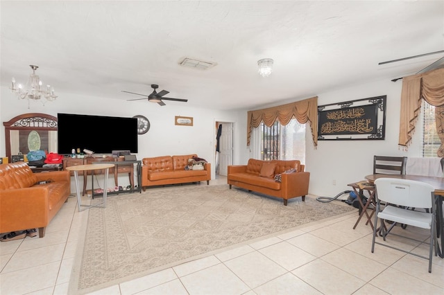 3280 Pinto Dr, Kissimmee, FL 34746 - living area with a chandelier, light tile patterned floors, and ceiling fan