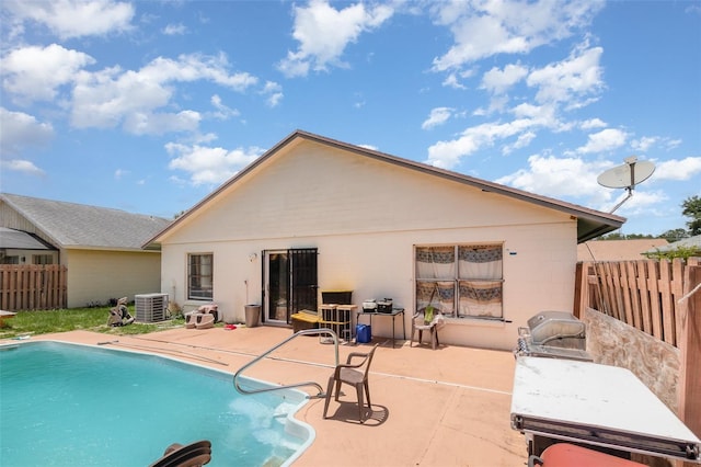 3280 Pinto Dr, Kissimmee, FL 34746 - back of property featuring a patio area