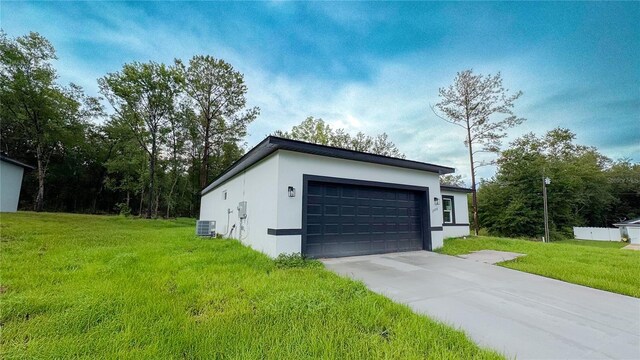 2498 W Magenta Dr, Citrus Springs, FL 34434 - garage featuring driveway