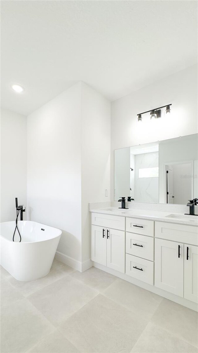 2498 W Magenta Dr, Citrus Springs, FL 34434 - bathroom with double vanity and a soaking tub