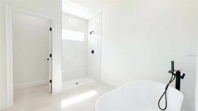 2498 W Magenta Dr, Citrus Springs, FL 34434 - bathroom with a freestanding bath, tiled shower, and recessed lighting