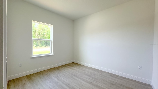 2498 W Magenta Dr, Citrus Springs, FL 34434 - spare room with light wood-style floors