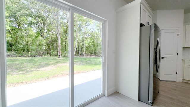 2498 W Magenta Dr, Citrus Springs, FL 34434 - entryway with light wood finished floors